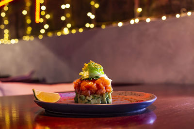 Close-up of fruits served on table in restaurant