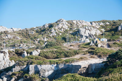 Scenic view of mountains against clear blue sky