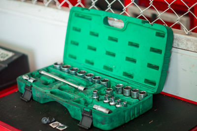 High angle view of machine in container