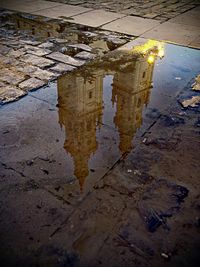 Reflection of puddle in lake