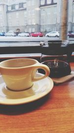 Close-up of coffee cup on table