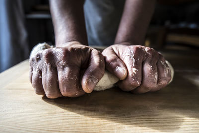 Close-up of person working on table