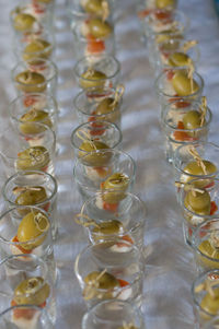 High angle view of food in glasses on table