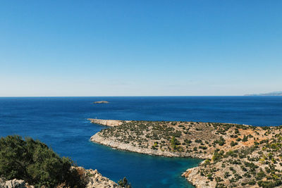 High angle view of calm sea against clear sky