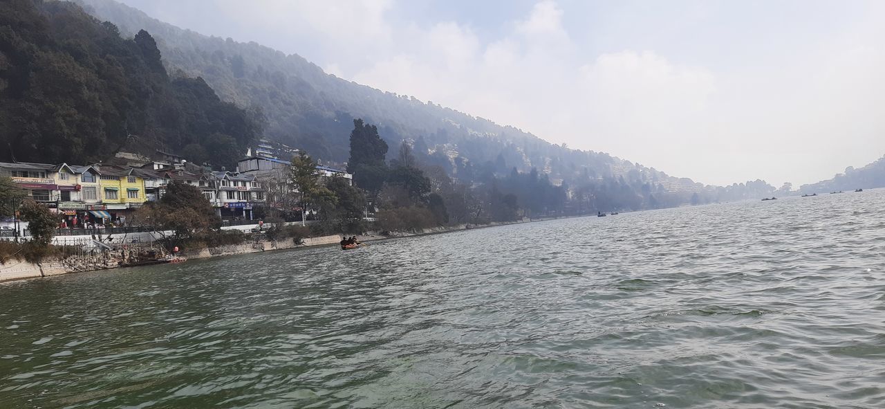 PANORAMIC VIEW OF SEA AGAINST BUILDINGS