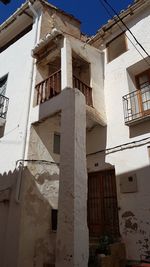 Low angle view of old building against sky