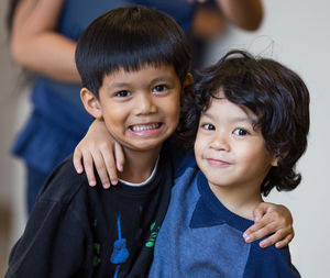 Close-up portrait of smiling boy