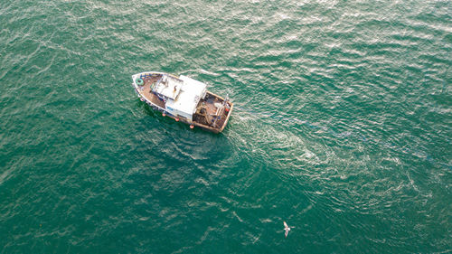 High angle view of abandoned boat in sea