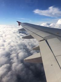 Low angle view of airplane flying in sky