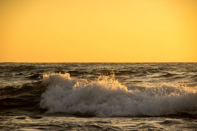 Scenic view of sea at sunset