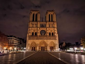 Buildings in city at night