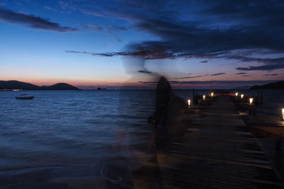 Scenic view of sea against sky at sunset