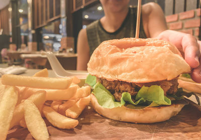 Close-up of burger on table in restaurant