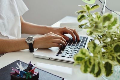 Woman using laptop on table