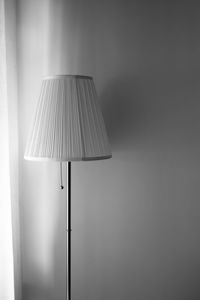 Lamp against wall at home
