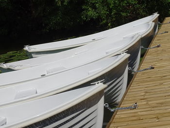 High angle view of boats moored on lake
