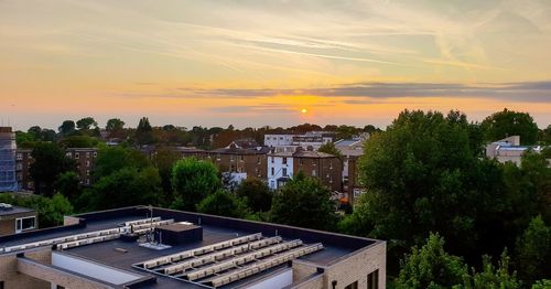 High angle view of townscape against sky during sunset