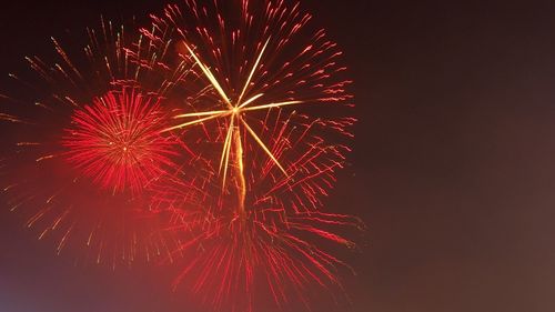 Low angle view of firework display