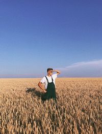 Full length of a young woman in the field