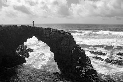 Scenic view of sea against cloudy sky