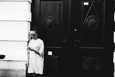 Full length of woman standing on floor