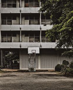 View of basketball court against building
