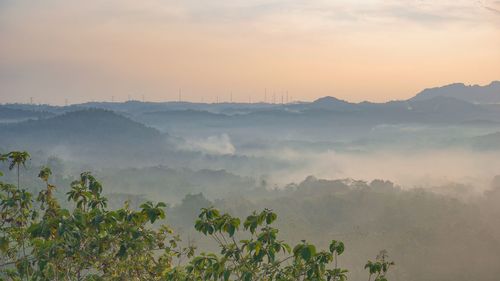 Scenic view of mountains against sky during sunset