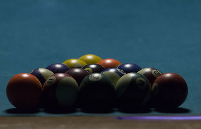 Close-up of pool balls on table