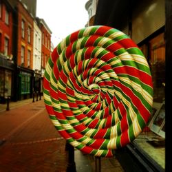 Close-up of multi colored umbrella at night