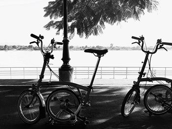 Bicycle parked against sky