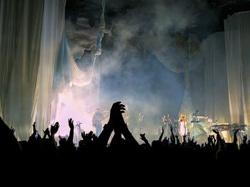 Panoramic view of crowd at music concert