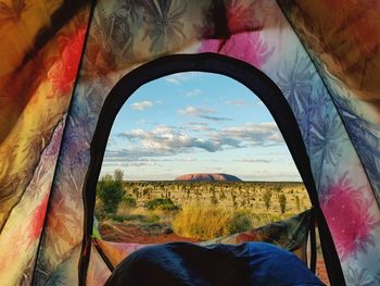 Scenic view of landscape seen through glass