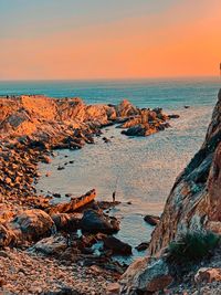 Scenic view of sea against sky during sunset