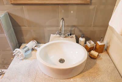 High angle view of faucet in bathroom at home