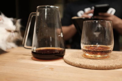 Close-up of drink in jar on table