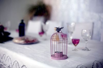 Close-up of wine bottles on table