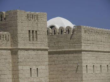 Low angle view of historical building against clear sky