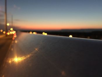 View of illuminated street light at dusk