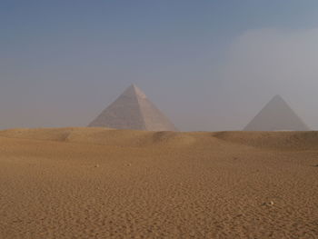 View of desert against clear sky