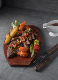 High angle view of vegetables on cutting board