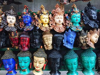 Low angle view of statues at market stall