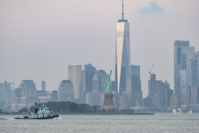 View of buildings in city at waterfront