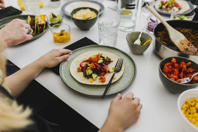 Tortilla with toppings on plate