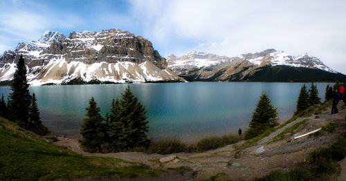 Scenic view of mountains and lake against sky