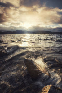 Scenic view of sea against sky during sunset