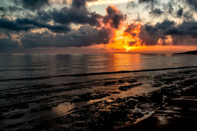 Scenic view of sea against sky during sunset