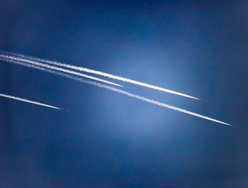 View of vapor trails in sky