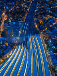 High angle view of light trails on road