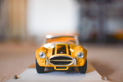 Close-up of toy car on table