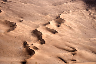 High angle view of sand dunes in desert